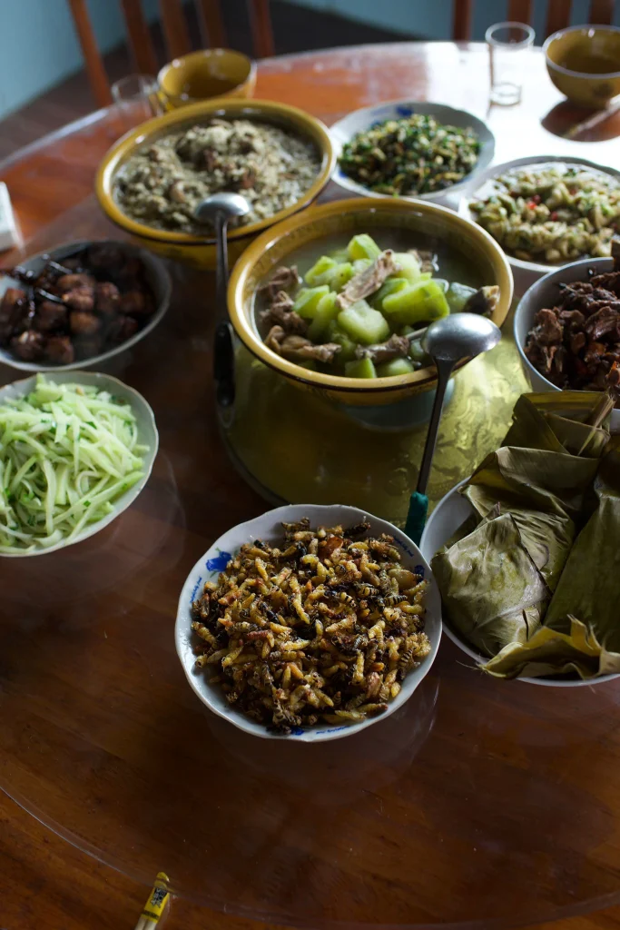 A table of ethnic cuisine with ten different dishes