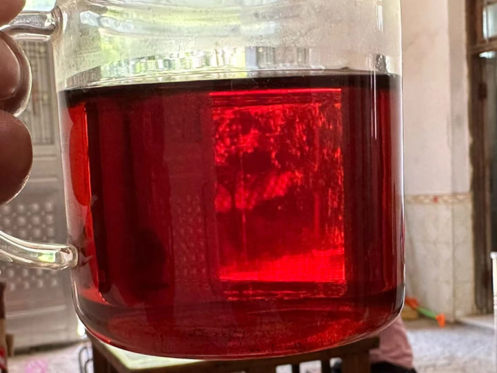 Deep red aged shou liquor