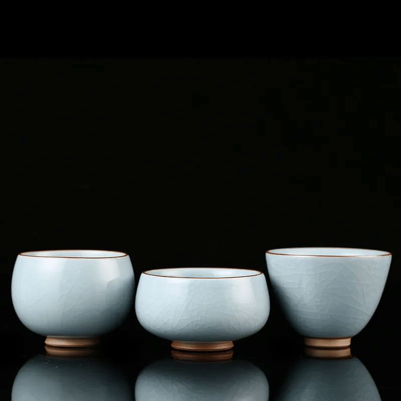 A sky-blue Ruyao master cup featuring the iconic matte, jade-like texture of Ru Kiln porcelain
