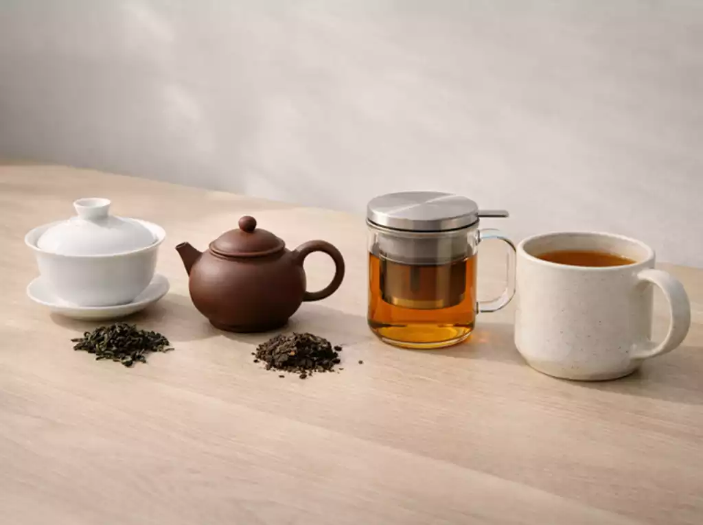Display of four different styles of ceramic tea tasting bowls